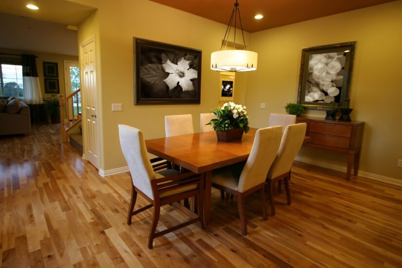 A refinished hardwood floor in a dining room